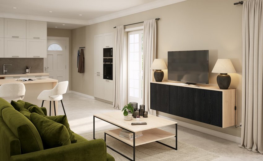 Salon aménagé avec table basse et meuble tv ouvert sur la cuisine