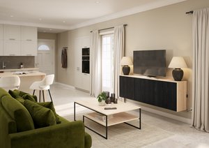 Salon aménagé avec table basse et meuble tv ouvert sur la cuisine